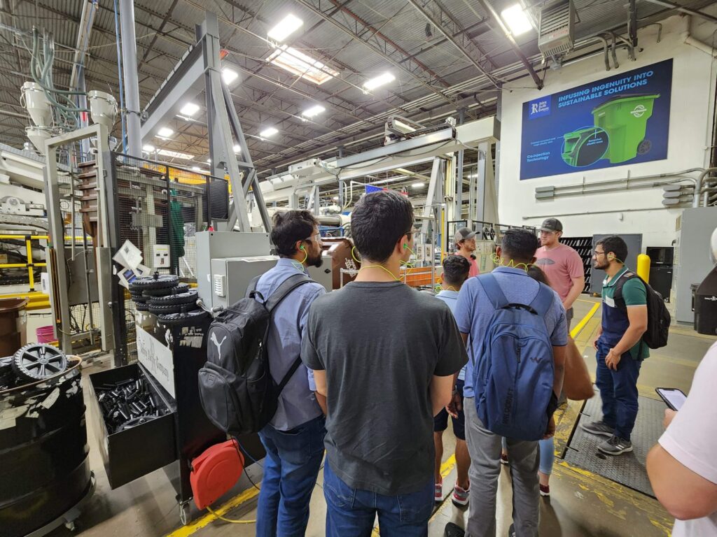 Students touring a manufacturing plant